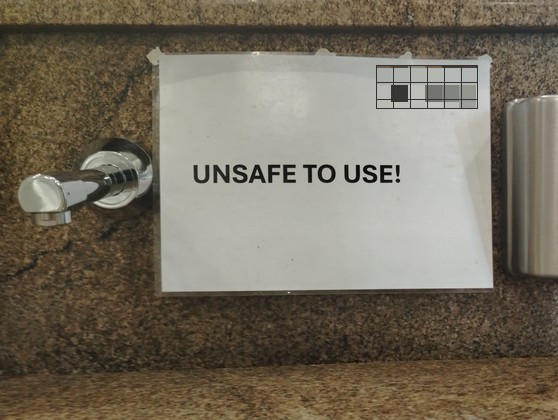 Power of words — unsafe to use sign next to a tap
